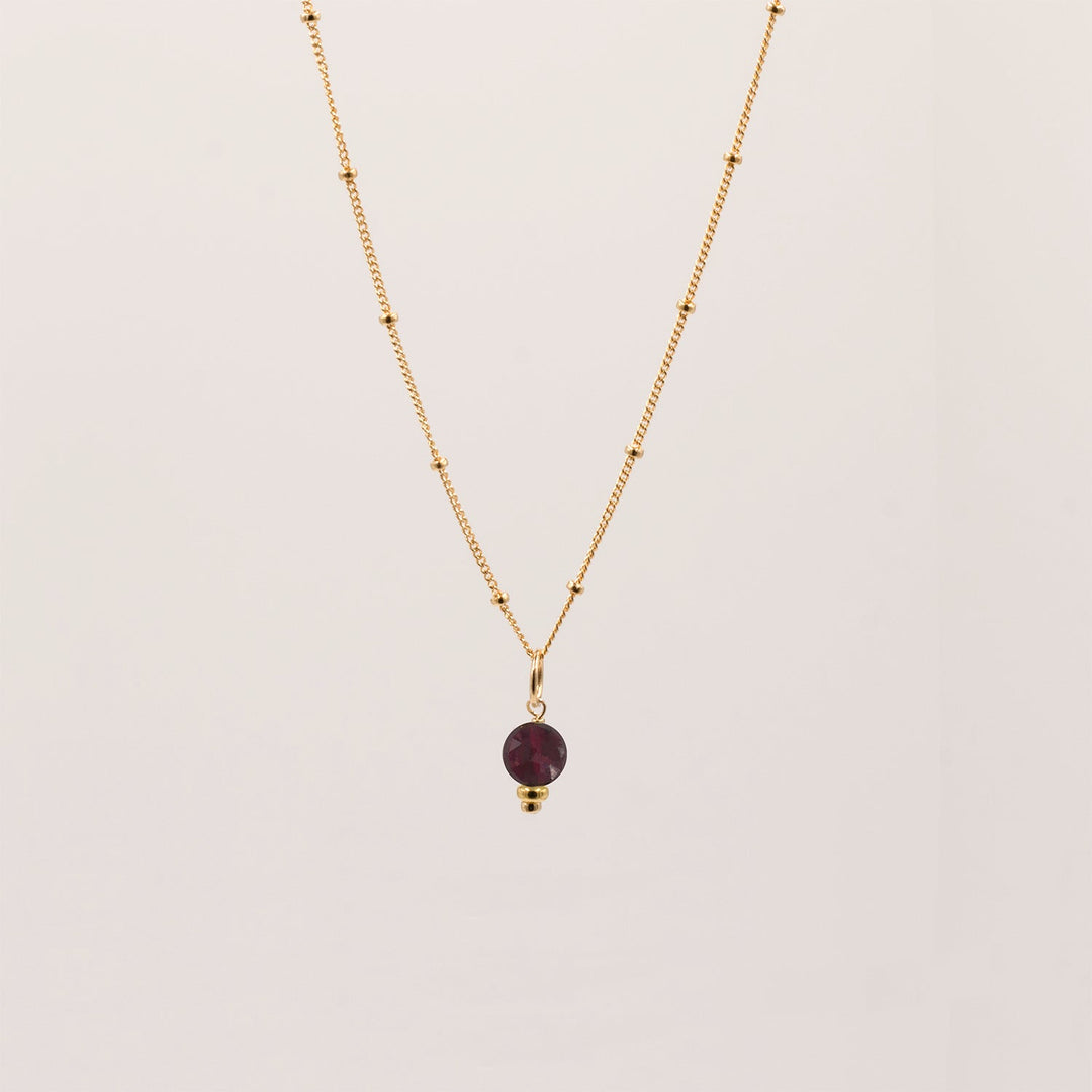 golden rondelle necklace - garnet coin charm - workshopunderground.com