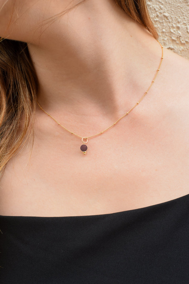 golden rondelle necklace - garnet coin charm - workshopunderground.com